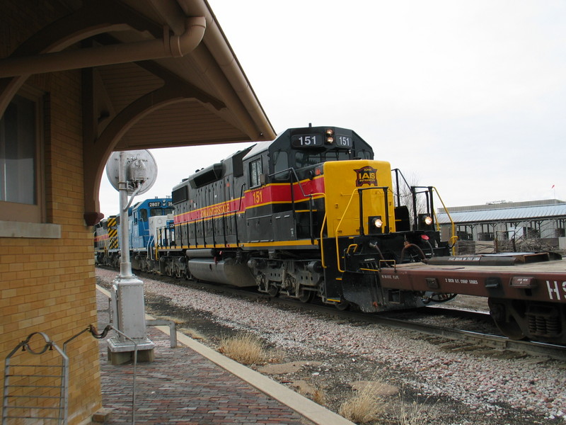 SD38s pull 2 HSs out of West Lib. siding, March 23, 2006.