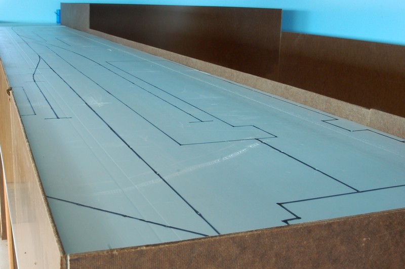 Following up from the 7/05/11 Progress Report, the trackplan has been transferred to the Grimes peninsula using the methods I outlined.  All elements, including track centerlines, roads, structures and even fence lines are shown.